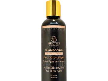 Flacon de shampoing NECTUS Argan & Fleur d’Oranger, soin doux pour tous types de cheveux.