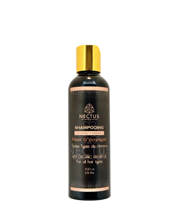 Flacon de shampoing NECTUS Argan & Fleur d’Oranger, soin doux pour tous types de cheveux.